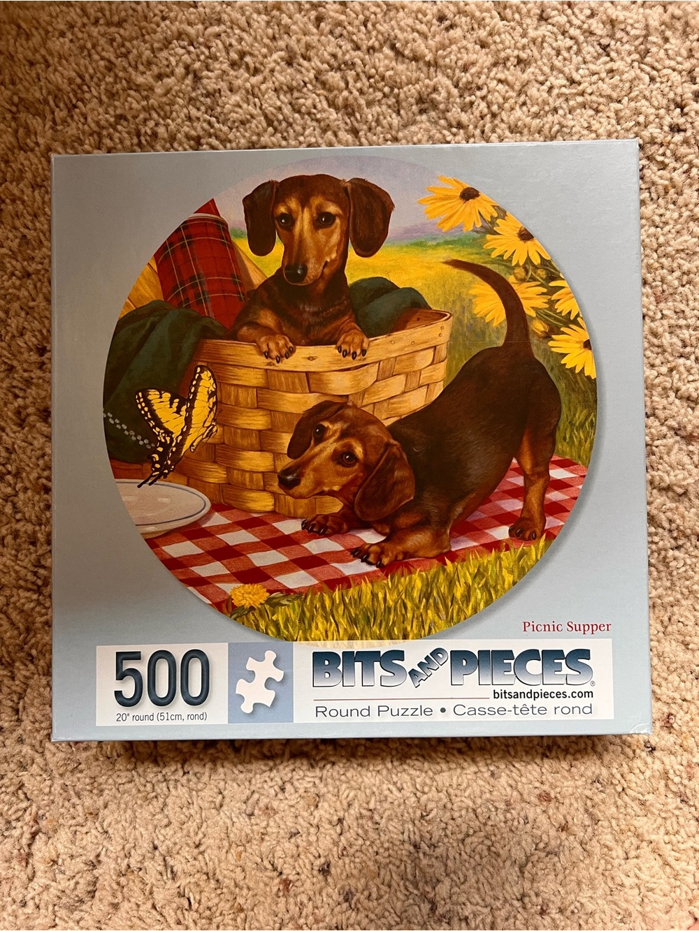 Bits and Pieces 500-Piece Round Puzzle — Picnic Supper Dachshunds